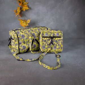 Expandable Travel Bag Yellow with Grey Flower Design.